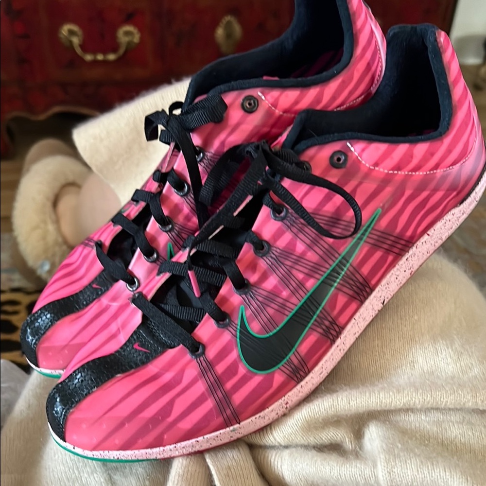 Nike Pink and Black Athletic Shoes with Sleek Design